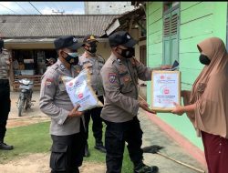 Polres Pringsewu Salurkan Bansos ke Masyarakat