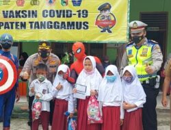 Vaksinasi Anak 6-11 Tahun, Polres Tanggamus Datangkan Dua Tokoh Anime Pahlawan Super