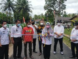 Bupati Tanggamus Resmikan Jalan Hotmik di Pekon Kalisari Wonosobo