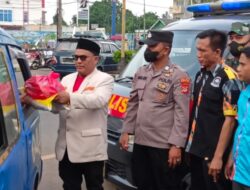 Polres Lampura Bagikan Bansos ke Masyarakat Terdampak Kenaikan BBM